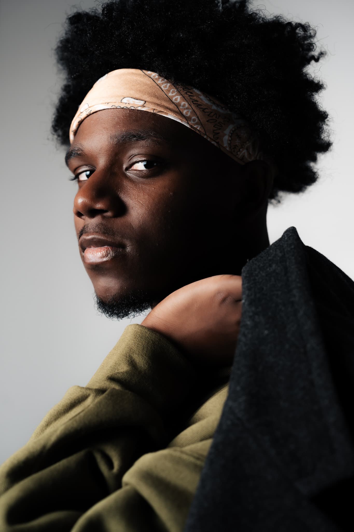 Sanyé in a 2024 Avaria Studios portrait by Daron English
